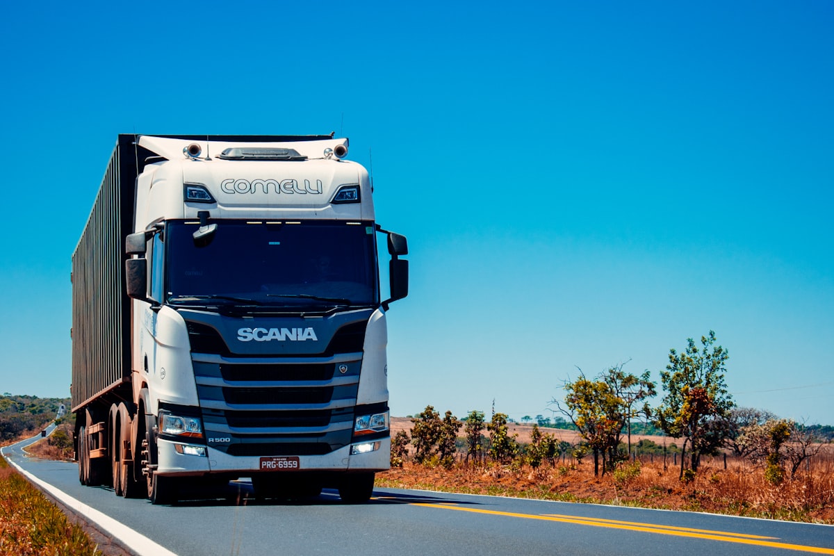 Commercial trucks on the road representing logistics and fleet information